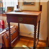 F58. One drawer turned leg nightstand. 31”h x 22”w x 18”d
